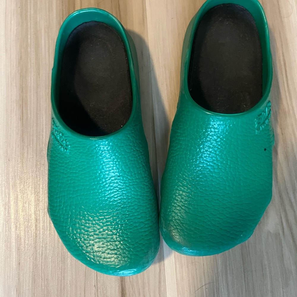 Birkenstock Green Mules with Textured Finish